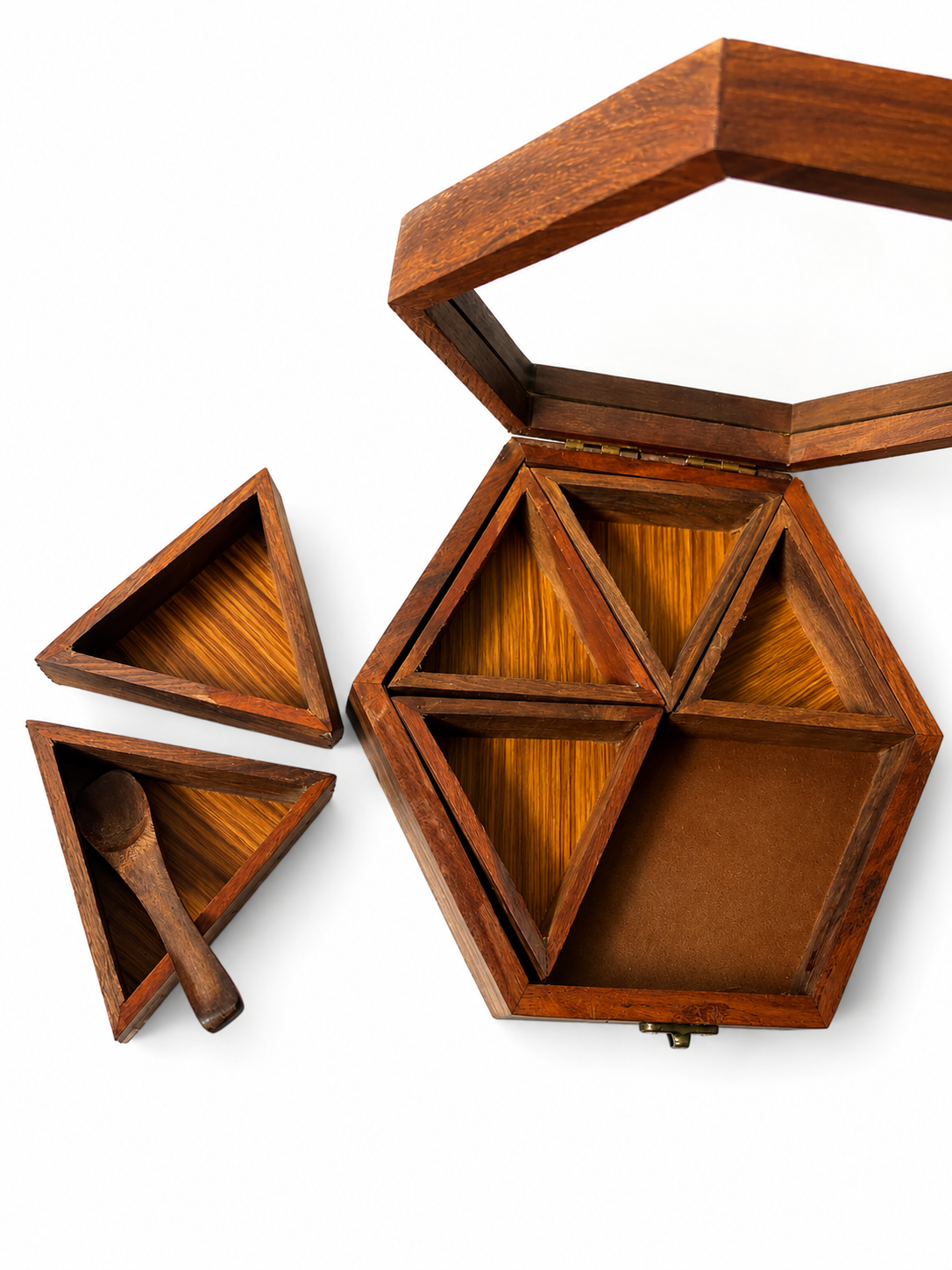 Top-down view of hexagonal masala box with spices in compartments